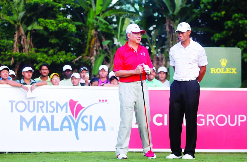 Woods back in Asia, preparing for next stage