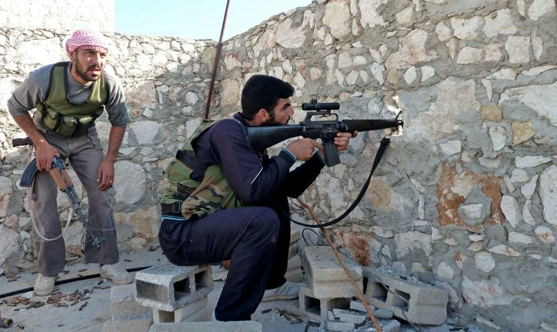 Syria rebels stop army advance on seized town