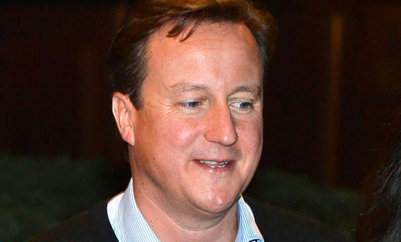 Britain must cut more to reduce deficit- PM Cameron