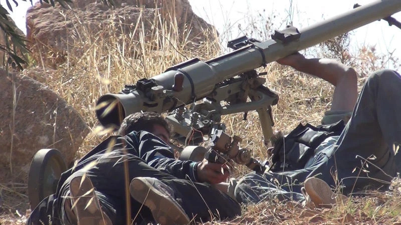 Rebels battle Assad’s forces for gateway to north Syria