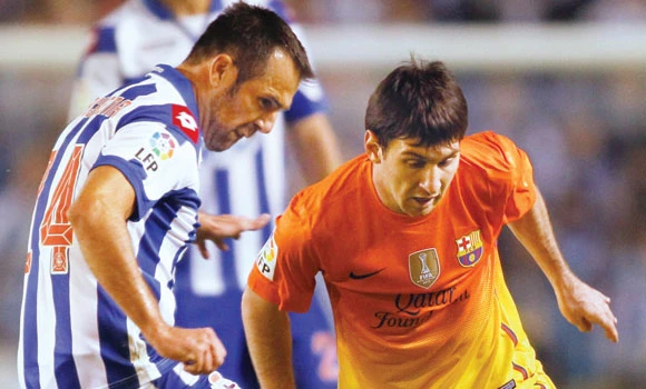 Messi hits 21st Barca hat trick in nervy win
