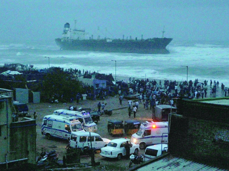 Tens of thousands flee as storm hits S. India