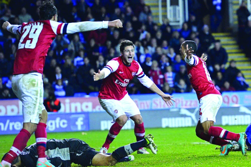 Arsenal posts remarkable comeback win over Reading