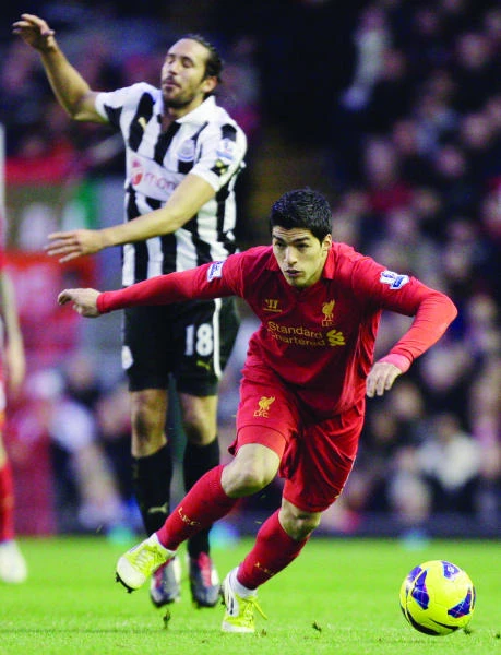 Suarez salvages Liverpool draw