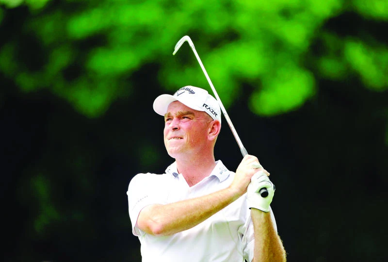 Bjorn leads rain-hit Singapore Open