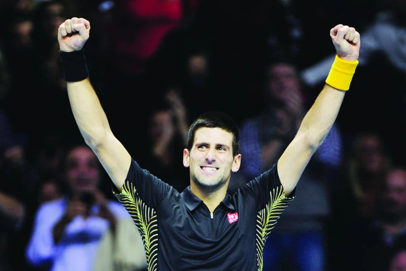 Djokovic subdues Berdych to reach last four in Finals