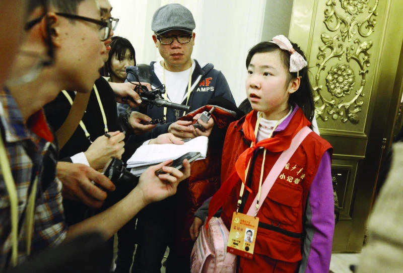 Teen reporter puts China officials in a spot