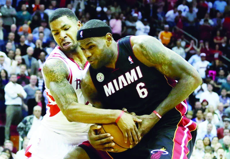 James, Heat ground Rockets 113-110