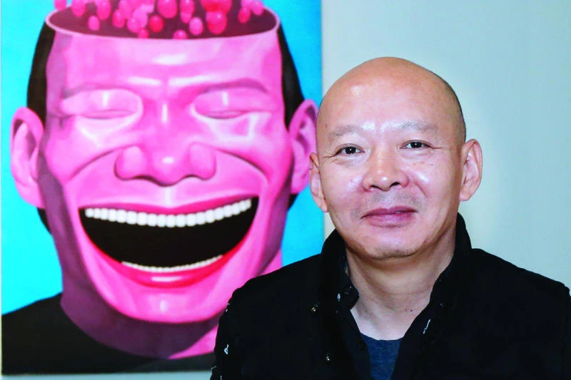 Chinese art star Yue brings ‘laughing men’ to Europe