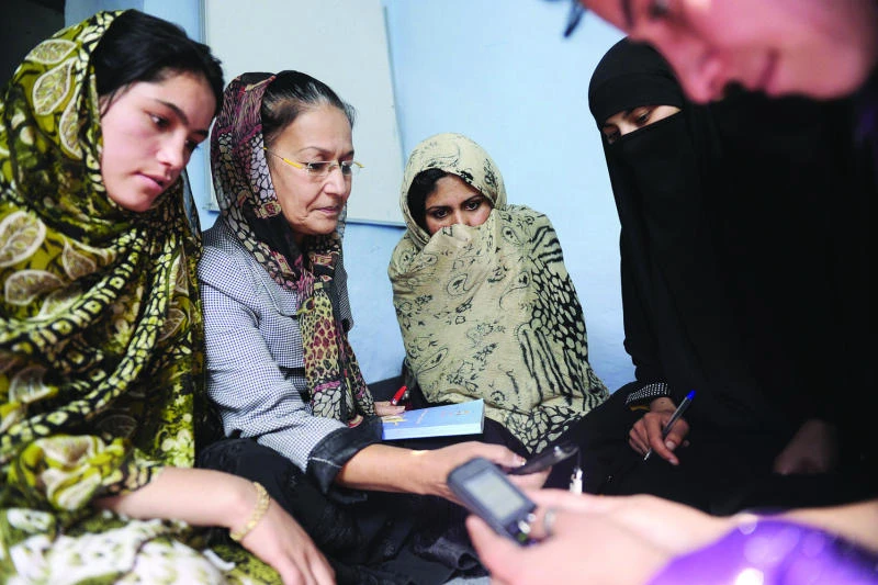 Afghan women learn literacy through mobile phones