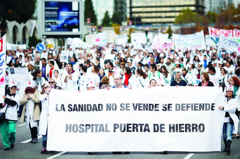 Tens of thousands of health workers protest in Spain