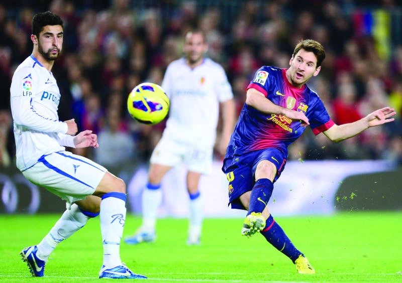 Messi stars Barca win; Real Madrid has it easy