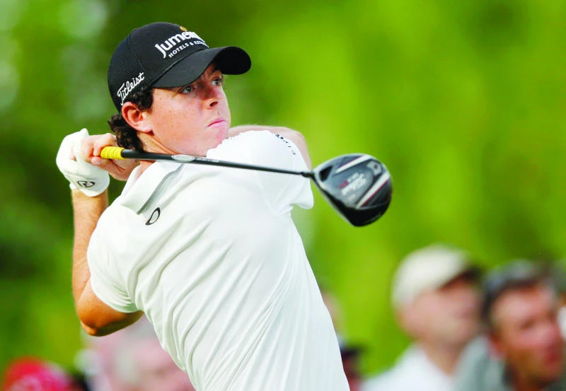 McIlroy, Donald, Warren share lead in Dubai