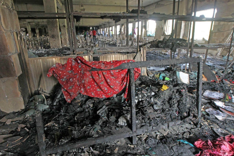Bangladesh hunts owner after factory inferno