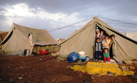 Syria Kurds flee regime shelling in terror