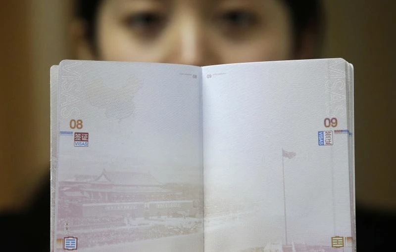 China puts Himalayan claims on passport map, India maps its own