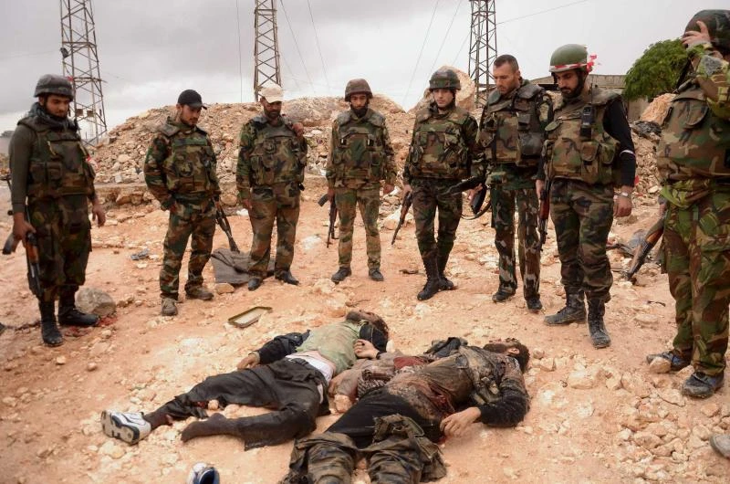 Assad forces pound rebel bases; thousands of Kurds flee homes