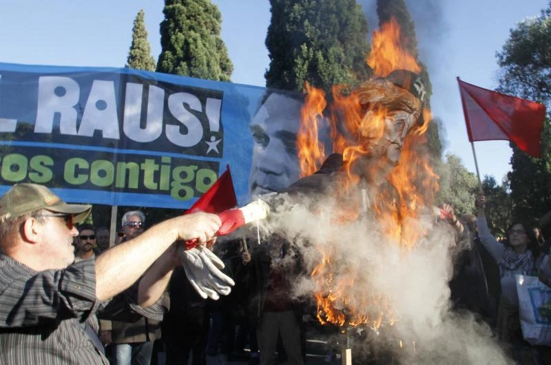 Protests greet Merkel in bailed-out Portugal