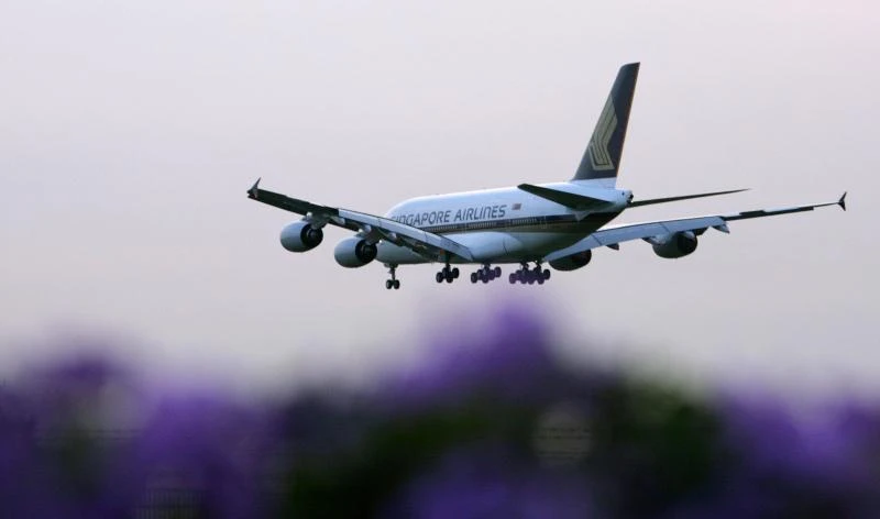 Singapore Airlines Q2 profit falls 54%, says outlook challenging