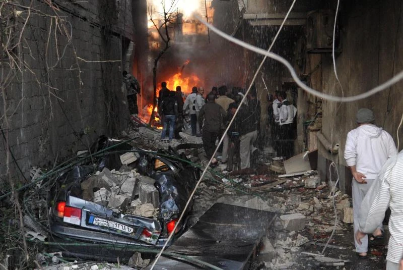 Blasts kill 54 near Syrian capital, second aircraft downed