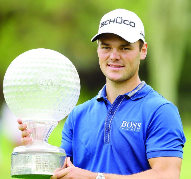 Kaymer ends drought in rainy Sun City