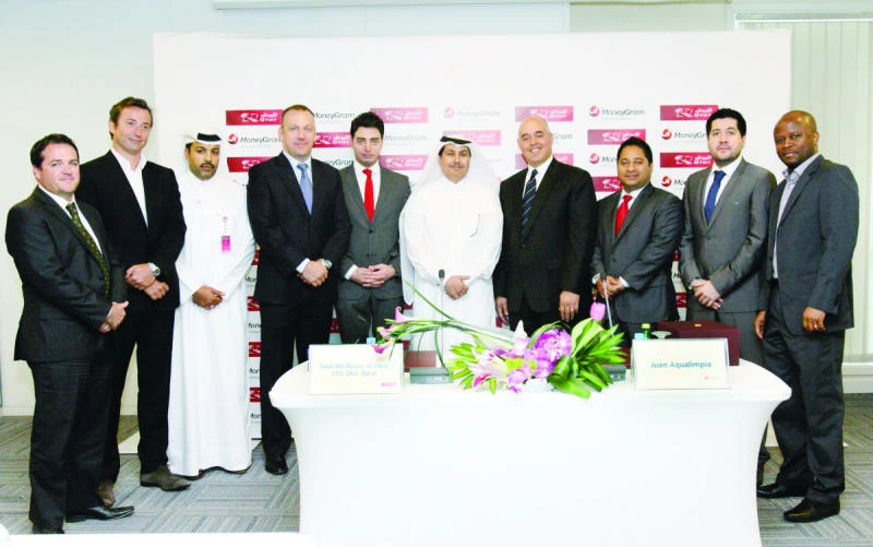 MoneyGram and Qtel tie up for mobile money transfer service