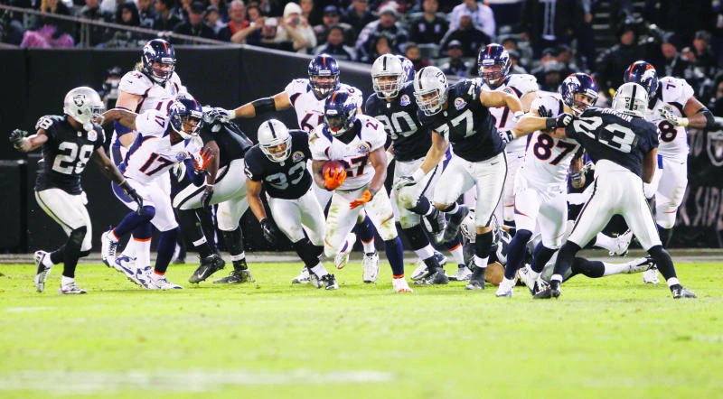 Manning leads Broncos past Raiders