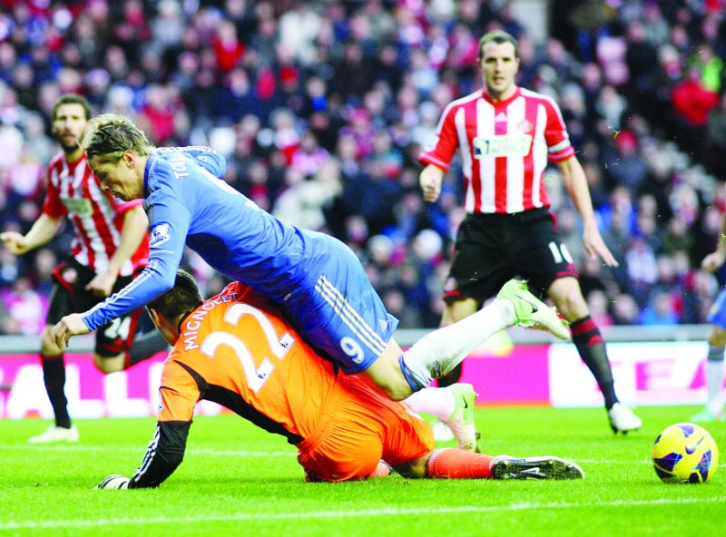 Torres double as Chelsea bites back
