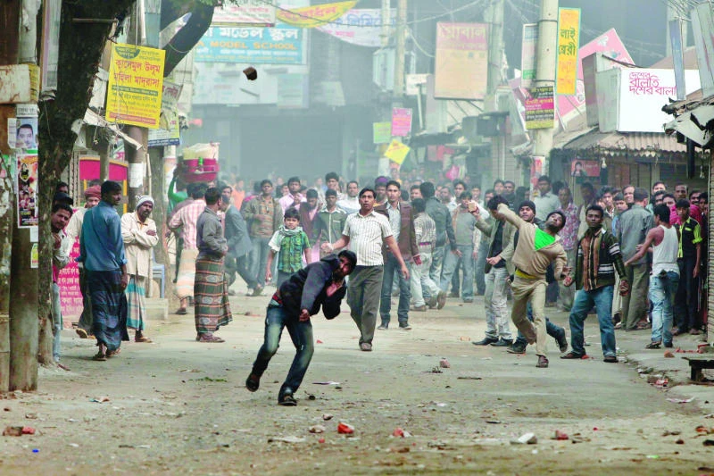 Two killed, dozens hurt as police clash with protesters in Bangladesh