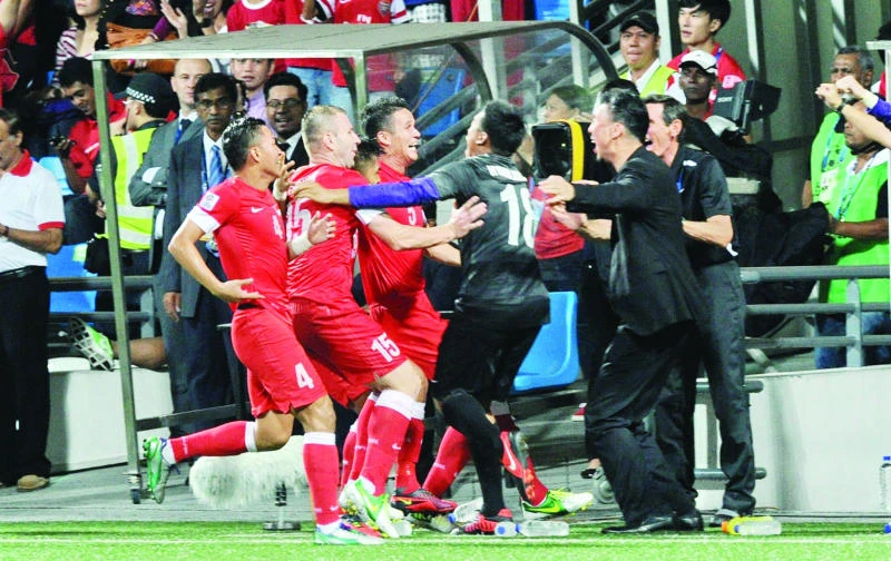 Amri fires Singapore into Suzuki Cup final