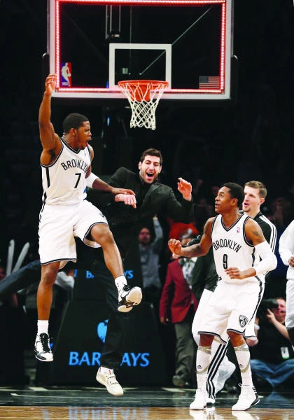 Johnson’s buzzer-beater in 2nd OT lifts Brooklyn