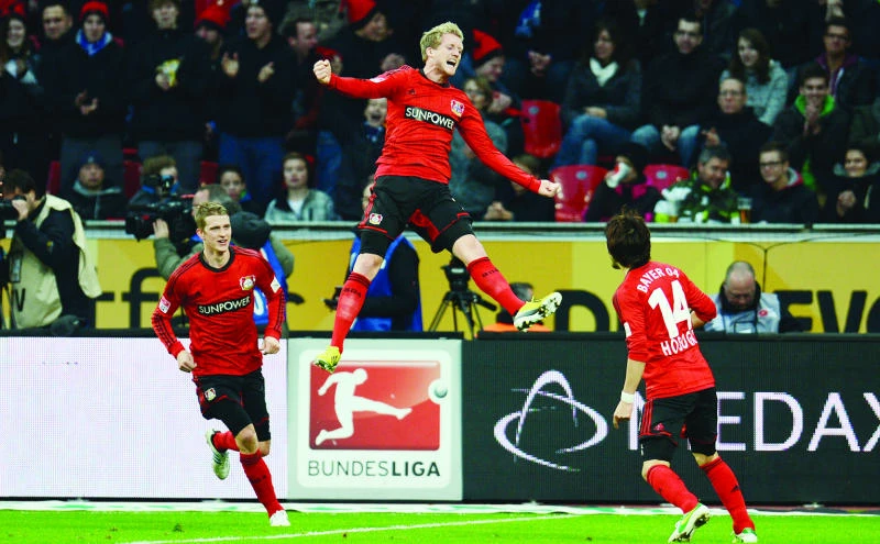 Leverkusen routs Hamburg to trim Bayern’s lead