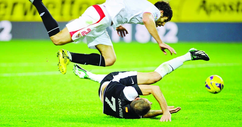 Malaga boosts European hopes with Sevilla win