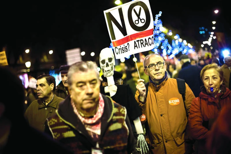 Spanish PM defends year of austerity amid protests