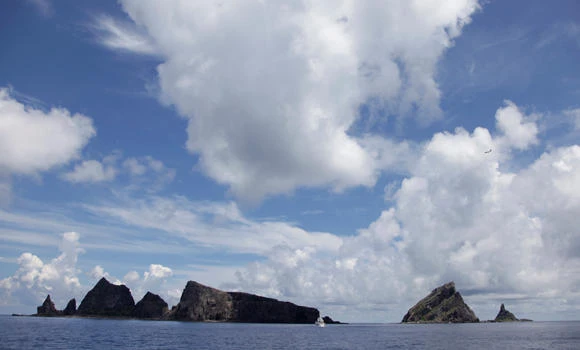 Japan scrambles jets as Chinese plane flies over disputed isles