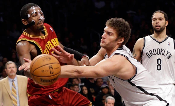 Nets hold off Cavs, move to 2-0 under Carlesimo