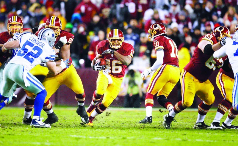 Redskins, Vikings grab last playoff berths