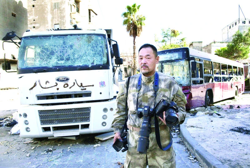 Adrenaline rush: Bored trucker turns war tourist