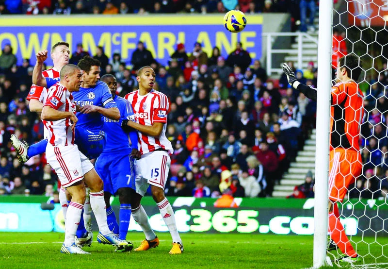 Stoke’s Walters helps Chelsea claim third as Spurs falter