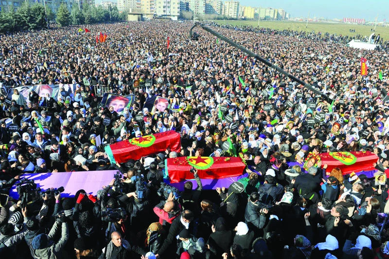 Thousands gather for slain Kurds’ funeral