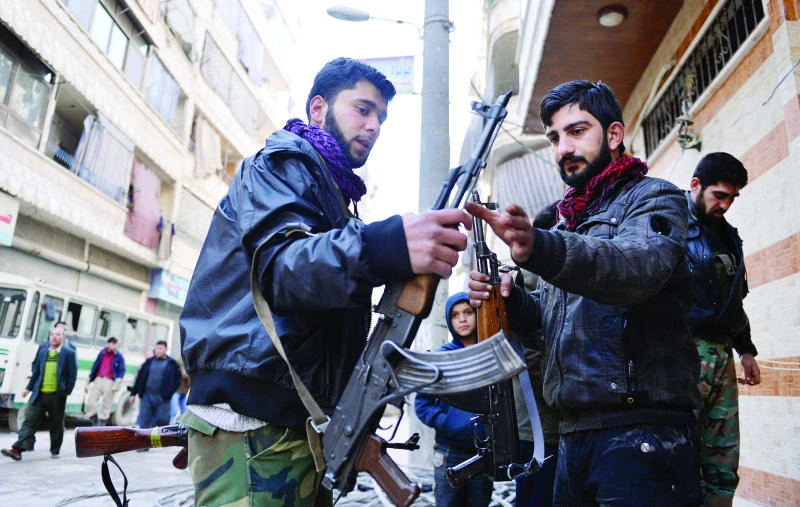 Syrian defector swaps army trumpet for rifle
