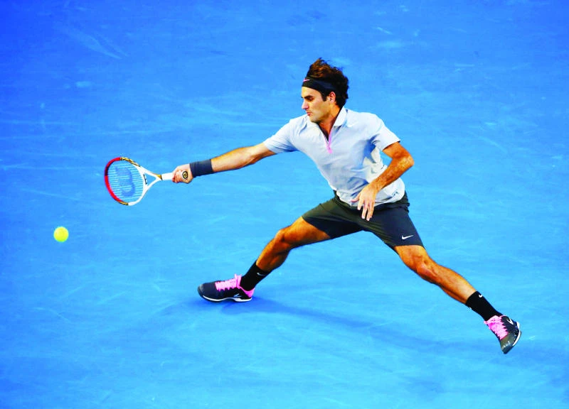 Federer shows Tomic the door