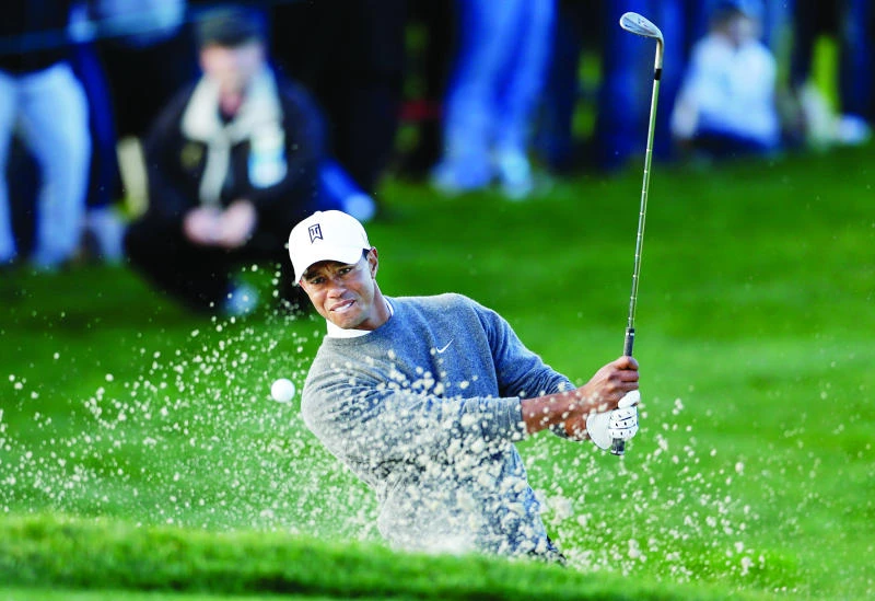 Woods in command at Torrey Pines