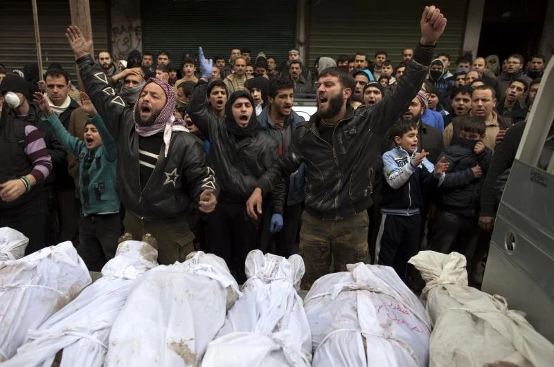 Free Syrian Army fighters vow to avenge Aleppo river massacre