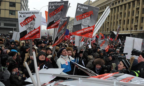 Russians march against anti-US adoption law