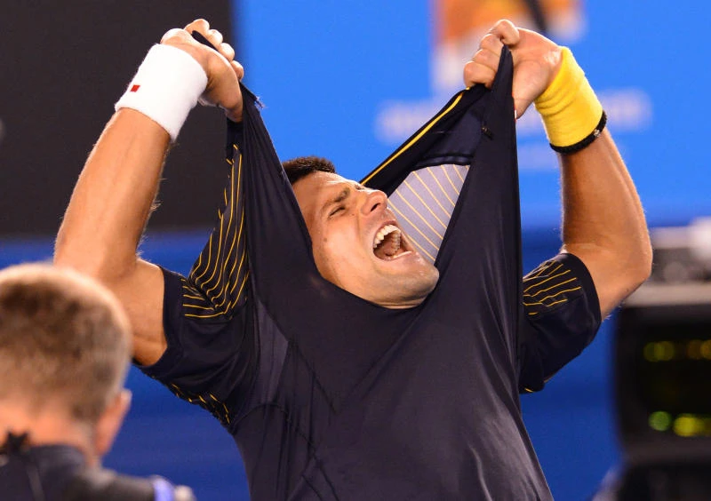 Djokovic fights off Wawrinka in five-set thriller