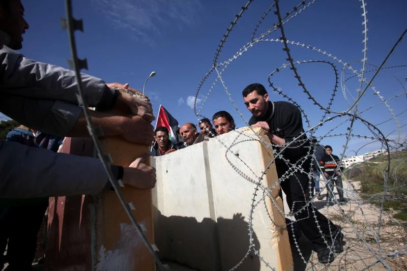 UN inquiry says Israel must remove settlers