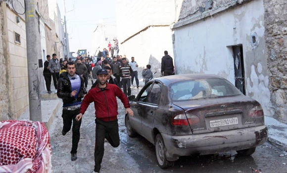 Syria starts 2013 with aerial strikes and clashes