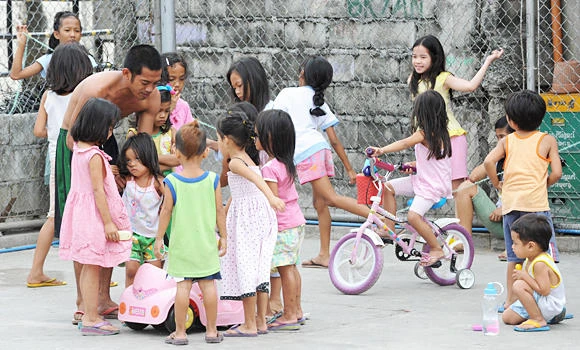 Manila birth control law takes effect