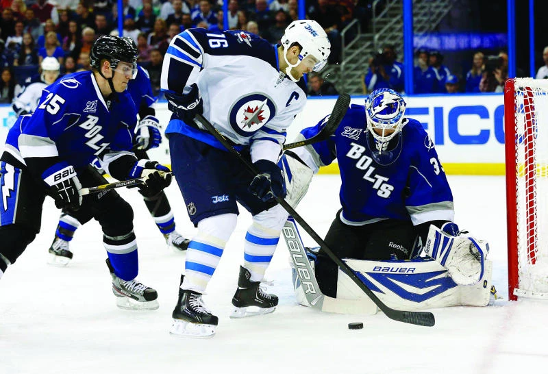 Conacher leads Lightning past Jets 8-3